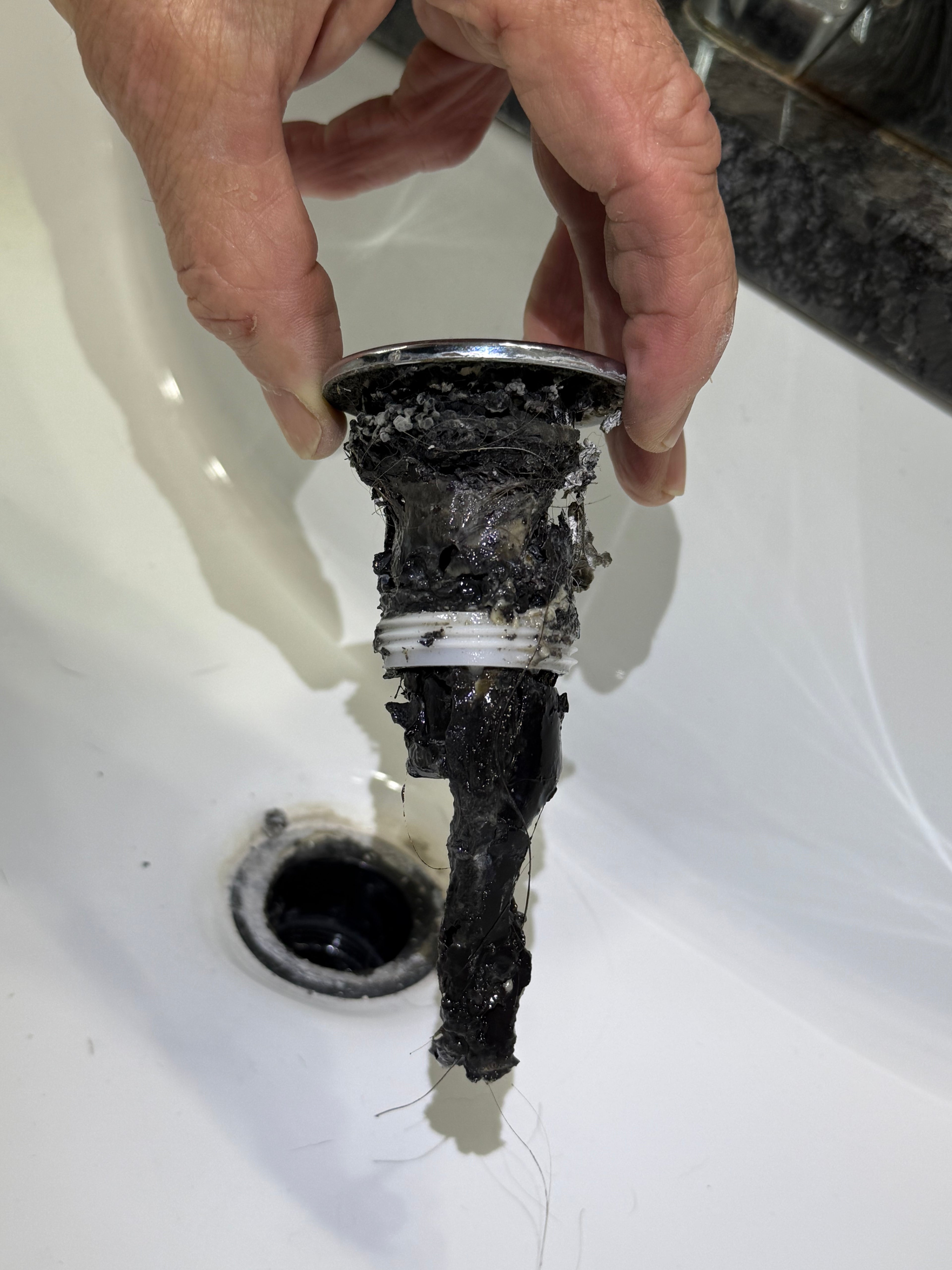 Mineral and limestone buildup before water conditioning