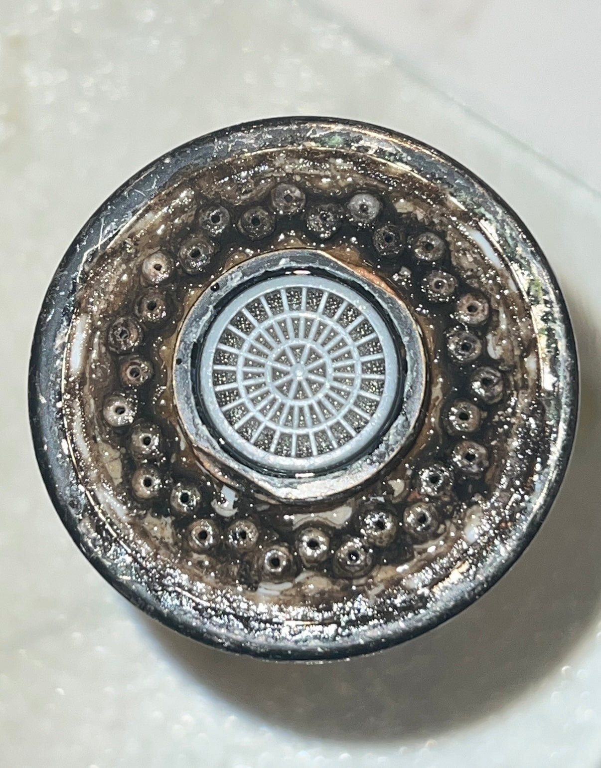 Mineral and limestone buildup before magsert water conditioners